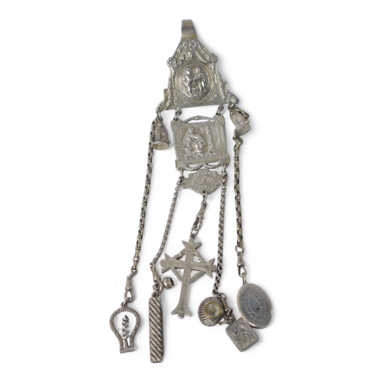 A late 19th/early 20th century continental white metal chatelaine, hung with six assorted accoutrements including a small silver box, a George III silver oval snuff box, a pen knife, compass and cross pendant. overall ap